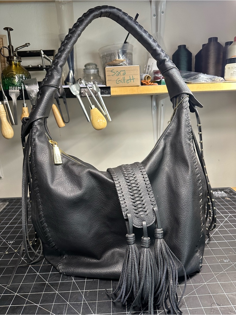 Big Buddha Black Leather Hobo with Braided Tassel Accent